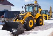 Колесный экскаватор –погрузчик New Holland