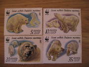коллекционные марки белые медведи.четыре штуки не гошенные